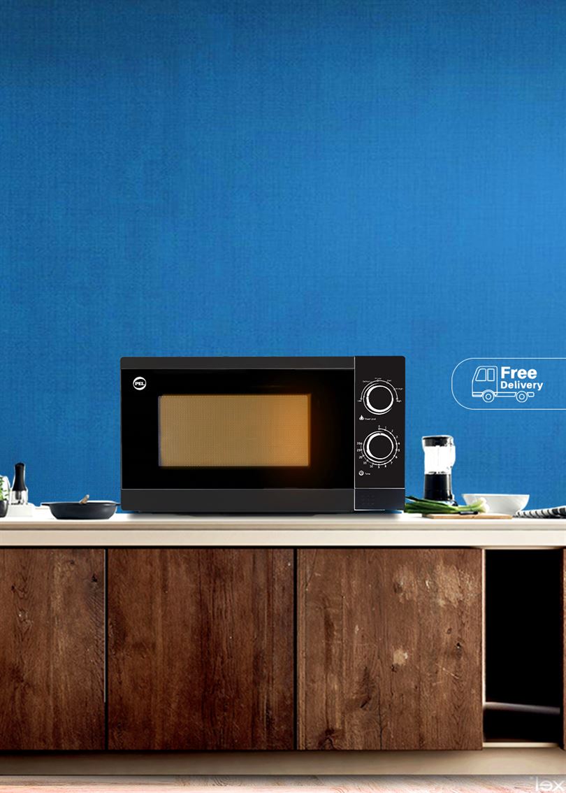 black microwave oven on a shelf